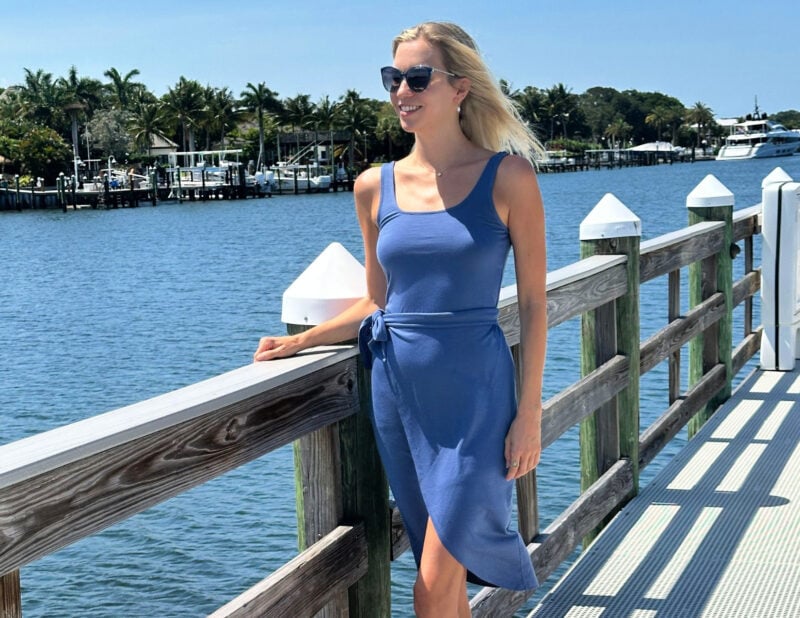 Ally Wearing Unbound Merino Dress on the dock in Florida