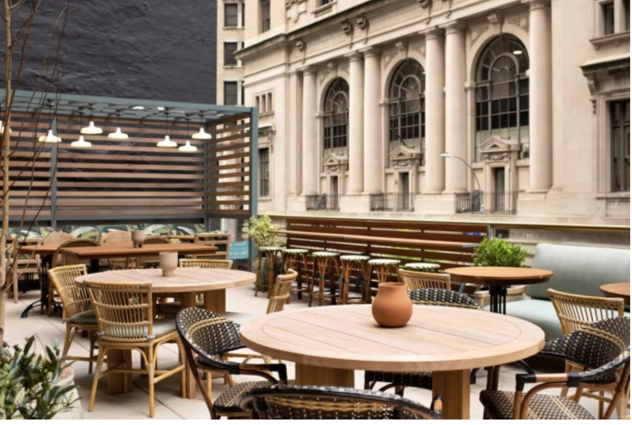 Everything You Need to Know to Spend New Year’s Eve in NYC (2026) Bar Harta, the Grayson Hyatt Hotel’s stylish cocktail bar in the middle of Times Square. - nye pr photo