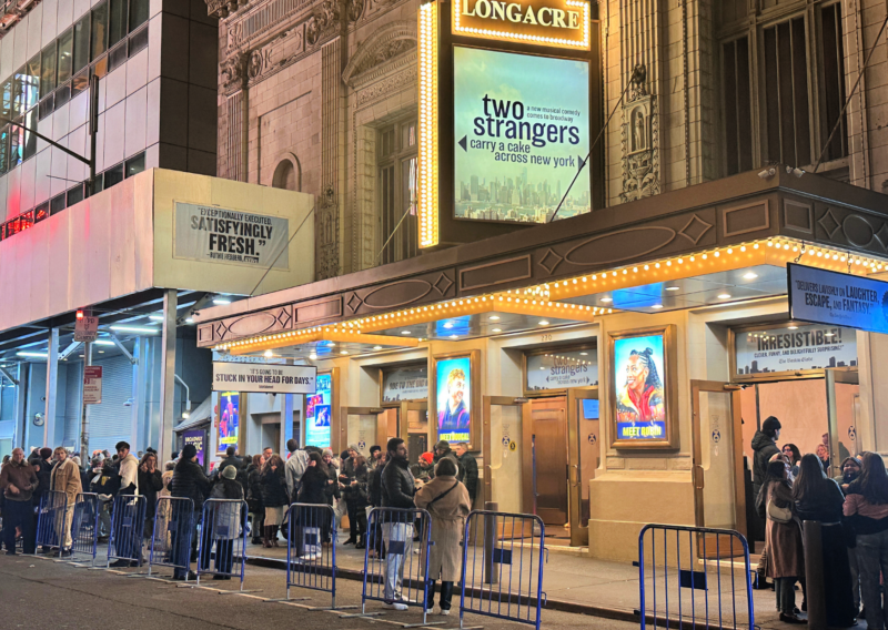 Best Shows on Broadway: 2026 Must-Sees! Two Stangers (Carry a cake across new york ) on broadway nyc at night marquee