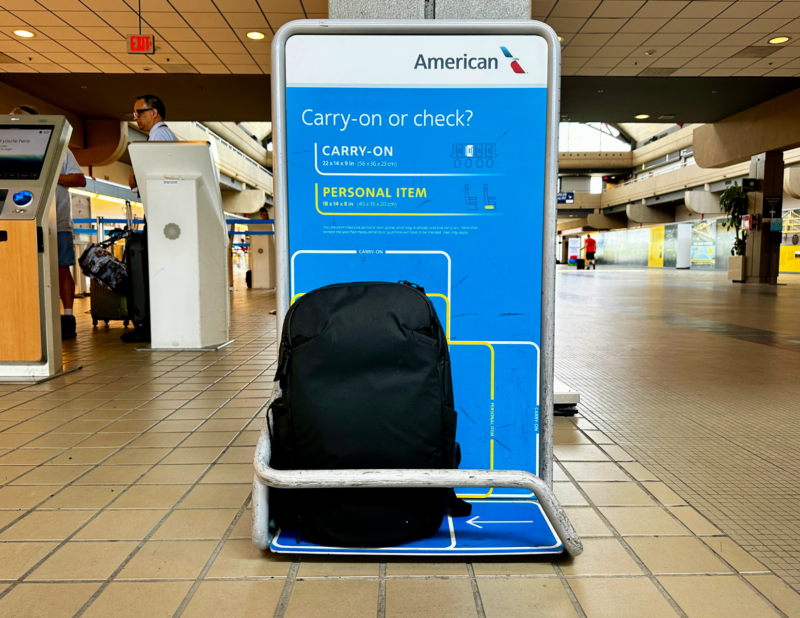Peak Design Travel Backpack 30L Review: Unpacking the Bag! ALLY TRAVELS - PEAK DESIGN TRAVEL BACKPACK IN THE AMERICAN AIRLINES PERSON ITEM SIZER AT THE AIRPORT
