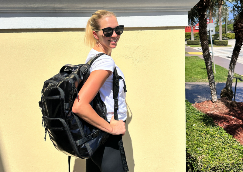 CALPAK Terra Backpack Review: Is It Ultimate Personal Item? Ally traveling with the CALPAK Terra Duffel Backpack in Florida