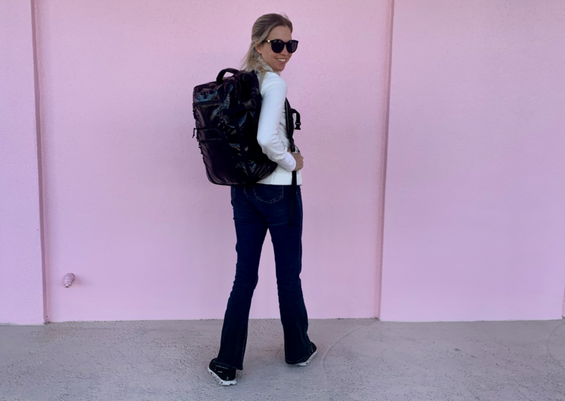 Bagsmart 38L Blast Pro Travel Backpack Review: The Best One? ally wearing the calpak terra 26l duffel backpack on a trip-3