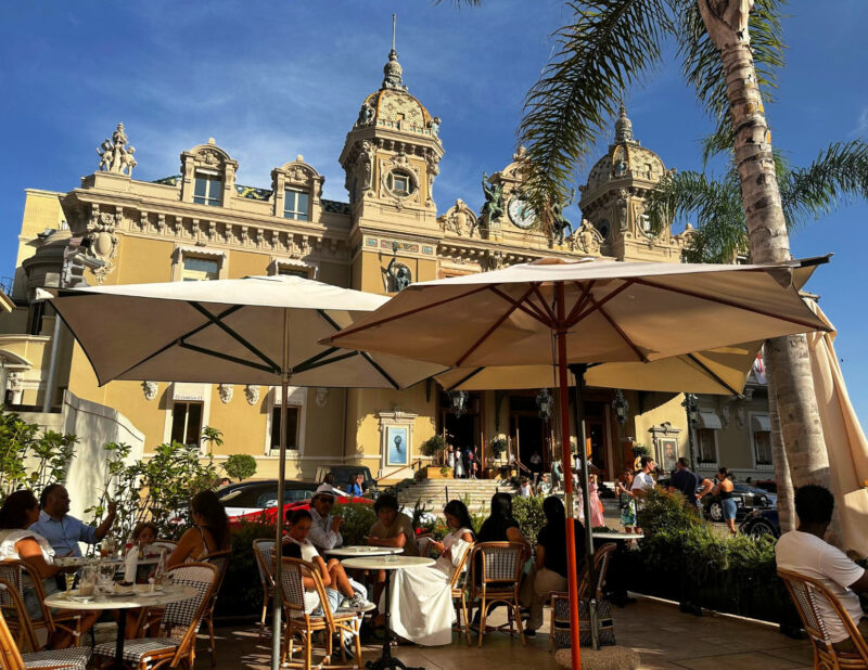 cafe de paris terrace overlooking the casino de monte carlo in monaco