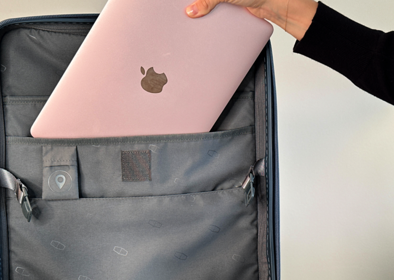 BAGSMART Getaway Carry-On Review: A Budget Travel Gem ALLY TRAVELS LAPTOP SLEEP INSIDE THE BAGSMART GETAWAY FRONT OPENING CARRY ON SUITCASE