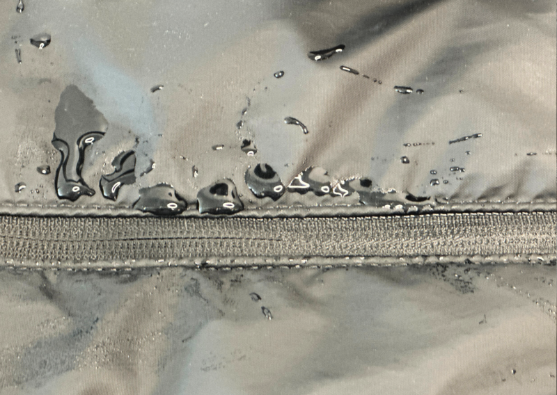 CALPAK Luka Duffel Review: Stylish and Functional Travel Bag WATER RESISTANT MATERIAL OF CALPAK LUKA DUFFEL