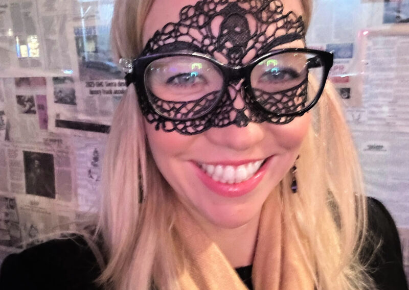 What to Wear at Masquerade NYC: The Phantom's Dress Code ally wearing the free masquerade mask at phantom with glasses