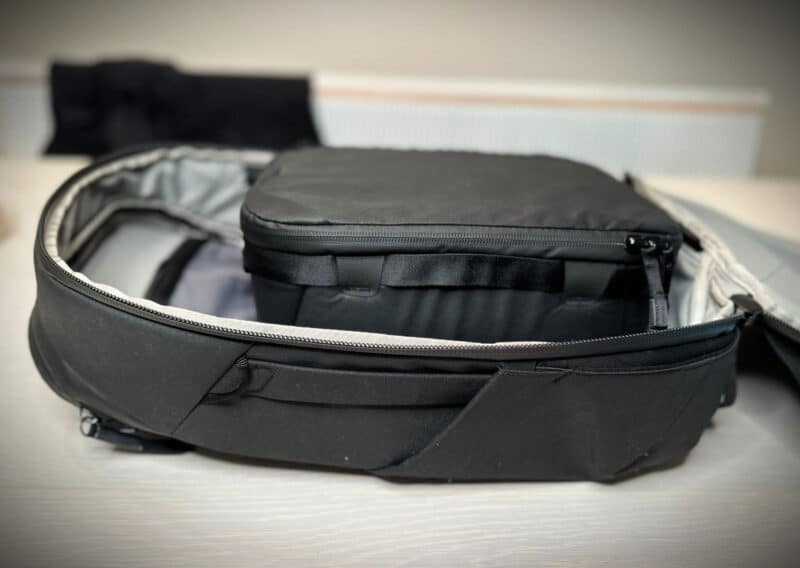 smedium Peak Design Camera Cube Review side view of it sitting in the peak design 30l travel backpack ally travels