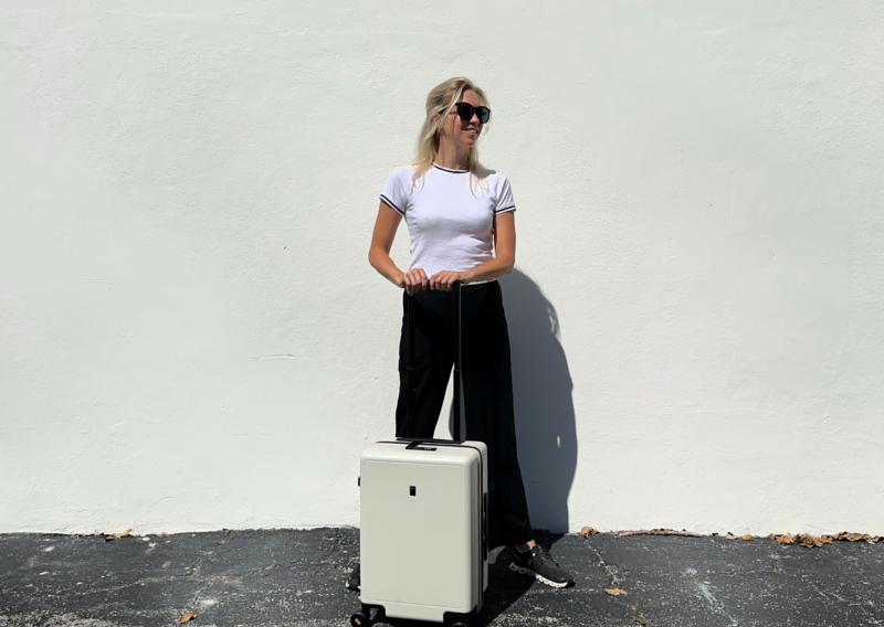 Level8 Luminous Carry-On Review: Worth the Hype? Ally traveling with the level8 luminous carry on 2022 wearing unbound merino travel pants