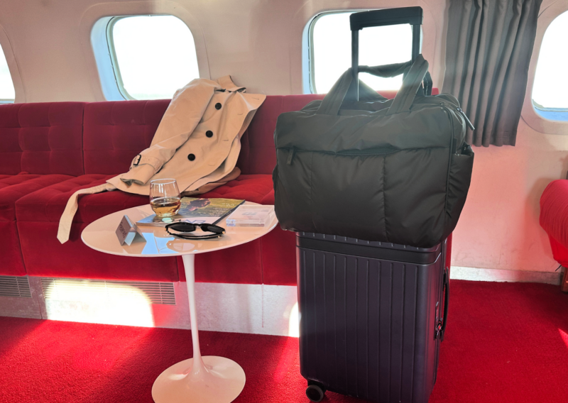 Carl Friedrik The Core Carry-On Review: Is It an Elite Bag? Ally Travels Vintage Coach Trench Coat JFK TWA HOTEL AIRPLANE BAR JFK CALPAK LUKA DUFFEL CARL FRIEDRICK THE CORE CARRY ON HARLOW SUNGLASSES