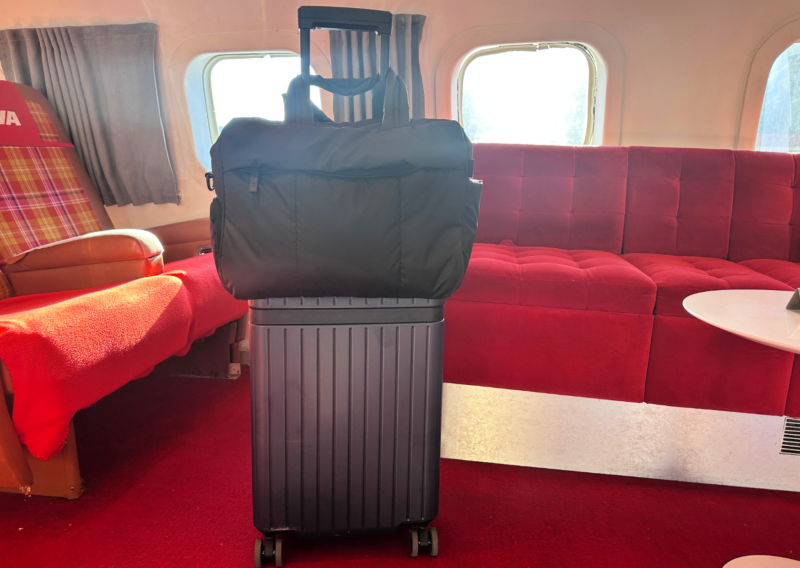 Carl Friedrik The Core Carry-On Review: Is It an Elite Bag? CARL FRIEDRICK THE CORE CARRY ON AND THE CALPAK LUKA DUFFEL ON THE TWA PLANE BAR AT JFK INTERNATIONAL AIRPORT