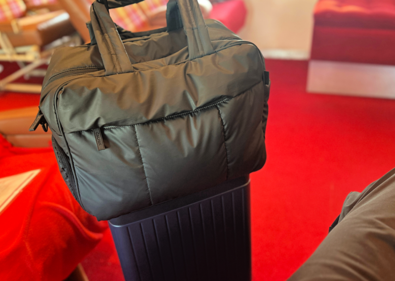 Carl Friedrik The Core Carry-On Review: Is It an Elite Bag? TWA HOTEL JFK AIRPORT AIRPLANE BAR ALLY TRAVELS CARL FRIEDRICK THE CORE CARRY ON WITH THE CALPAK LUKA DUFFEL