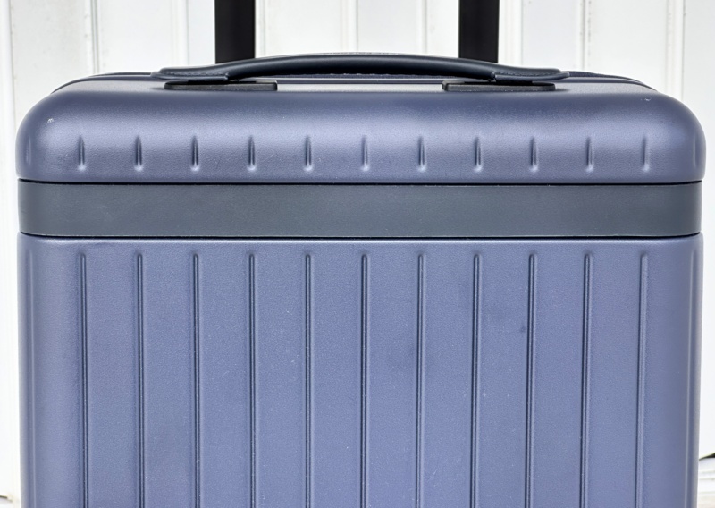 Carl Friedrik The Core Carry-On Review: Is It an Elite Bag? leather detailing on the Carl Friedrick The Core Carry On Review Ally Travels