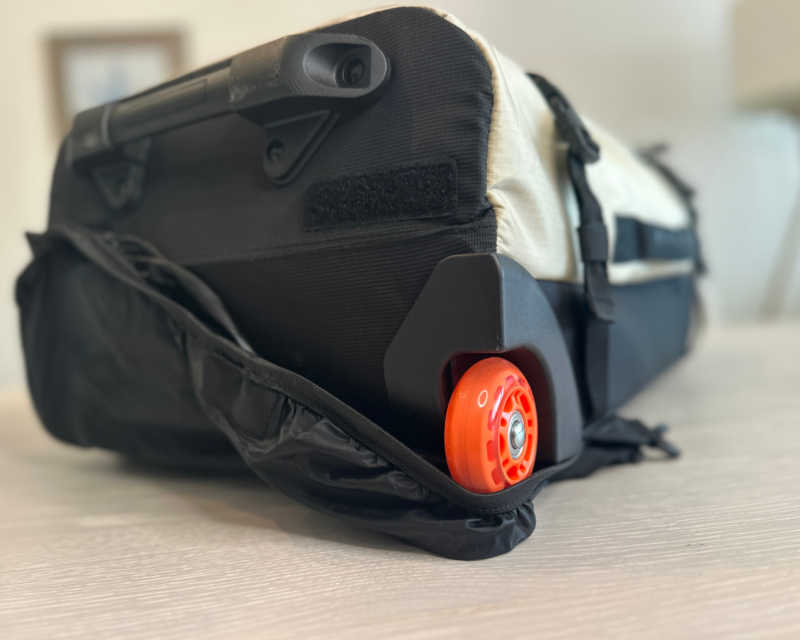 BAGSMART 43L Roller Backpack Review: Versatile for Any Trip bagsmart blast 43l roller backpack Wheel Cover ally travels review