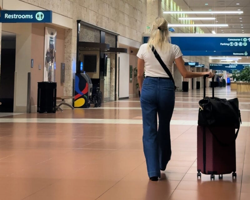 Best Amazon Prime Day Deals for Travelers: June 23-26th 2026 ally traveling with the quince carry-on quince leather weekender and bandolier crossbody pbi airport-3