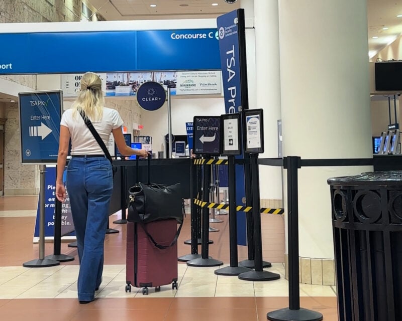 Quince Italian Leather Weekender Review: Worth It? tsa recheck ally traveling with the quince carry-on quince leather weekender and bandolier crossbody pbi airport