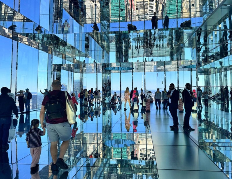 SUMMIT One Vanderbilt Review: Is the Immersive Deck Worth It? (2026) ALLY TRAVELS - SUMMIT One Vanderbilt Review_ Is the Immersive Deck Worth It? -mirror room at Summit one Vanderbilt in NYC - June 2026