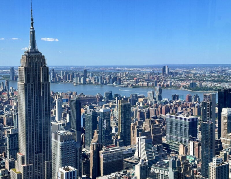 SUMMIT One Vanderbilt Review: Is the Immersive Deck Worth It? (2026) ALLY TRAVELS - SUMMIT One Vanderbilt Review_ Is the Immersive Deck Worth It? -view of Empire State Building and New Jersey from t Summit one Vanderbilt in NYC - June 2026
