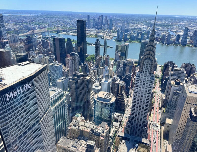 SUMMIT One Vanderbilt Review: Is the Immersive Deck Worth It? (2026) ALLY TRAVELS - SUMMIT One Vanderbilt Review_ Is the Immersive Deck Worth It? - view of MetLife and Chrysler Building Summit one Vanderbilt in NYC - June 2026