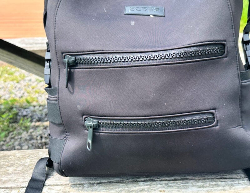 Dagne Dover vs. No Reception Club: Best Travel Diaper Bag? Dagne dover indi diaper backpack front zippers