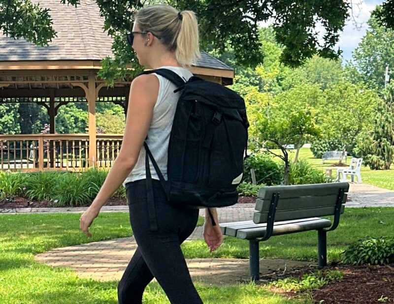Dagne Dover vs. No Reception Club: Best Travel Diaper Bag? ally travels no reception club backpack side view straps