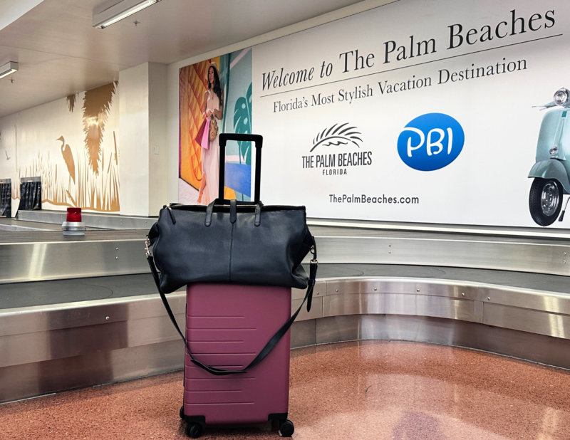 Quince Italian Leather Weekender Review: Worth It? ally travels quince leather weekender and quince carry on suitcase at pbi airport