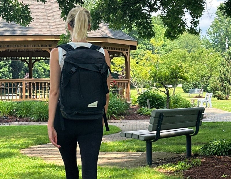 Dagne Dover vs. No Reception Club: Best Travel Diaper Bag? ally wearing the no reception club backpack
