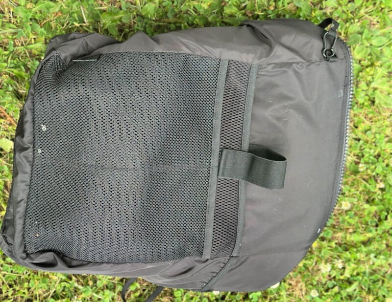 Dagne Dover vs. No Reception Club: Best Travel Diaper Bag? inside the Dagne dover indi backpack laptop compartment