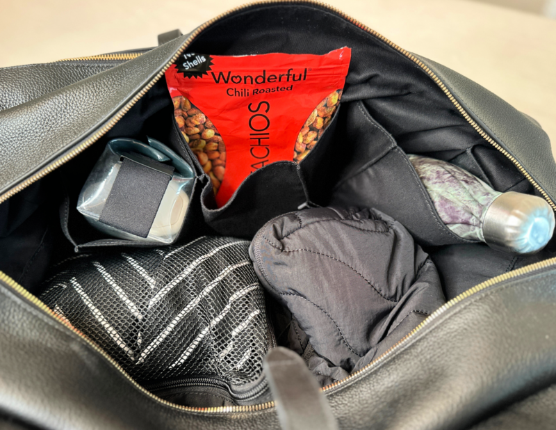 Quince Italian Leather Weekender Review: Worth It? Quince Italian Leather Weekender Cadence Parcel Pistachios swell bottle tomtoc tech pouch