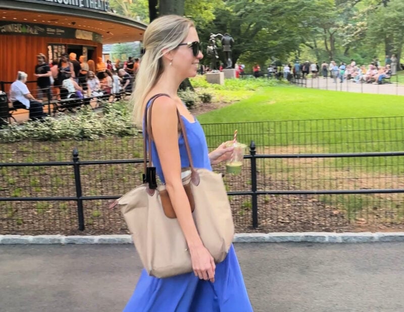 Shakespeare in the Park NYC: Your 2026 Guide to Free Theater ally at shakespeare in the park with her matcha, long champ bag, and mango dress