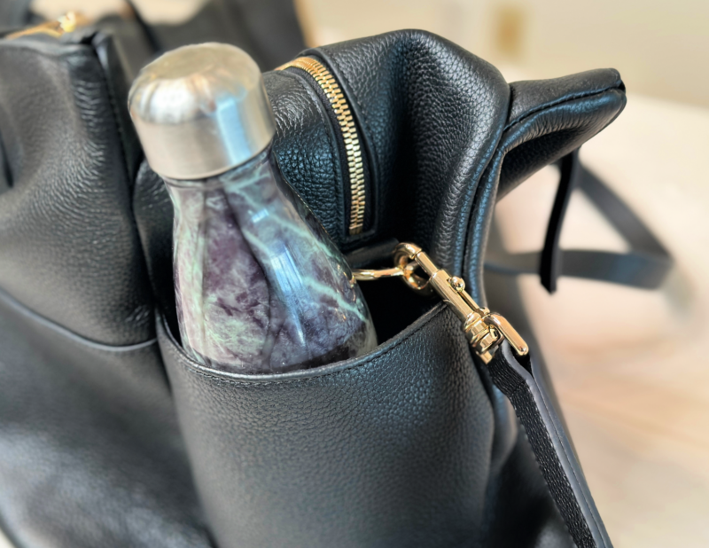 Quince Italian Leather Weekender Review: Worth It? quince leather weekender swell water bottle