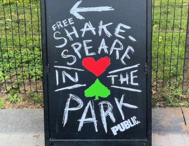 Shakespeare in the Park NYC: Your 2026 Guide to Free Theater shakespeare in the park sign Central Park coming from the upper east side